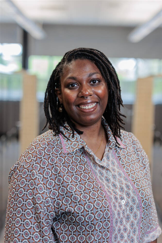 Person smiling at camera.